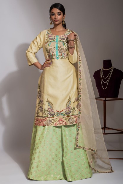 Elegant Cream Kurta and Green skirt