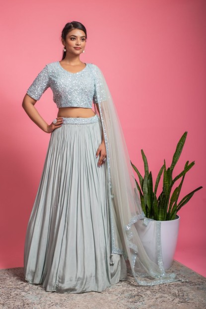 Heavy sequins Blouse with beautiful Skirt and Net Dupatta in Sea Blue color