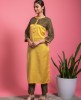 Yellow simple Kurti with Mehndi Brown Pants.