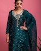 Peacock Green color Kurti and Pants with Organza Dupatta
