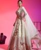 Ivory Lehenga Choli Set In Raw Silk With Hand Work