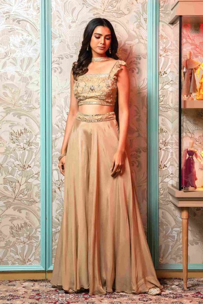 Warm Beige color Crop Top and Sharara with matching Dupatta in Chinnon