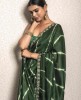 Dark Green color Leheriya style Saree in Dola Silk