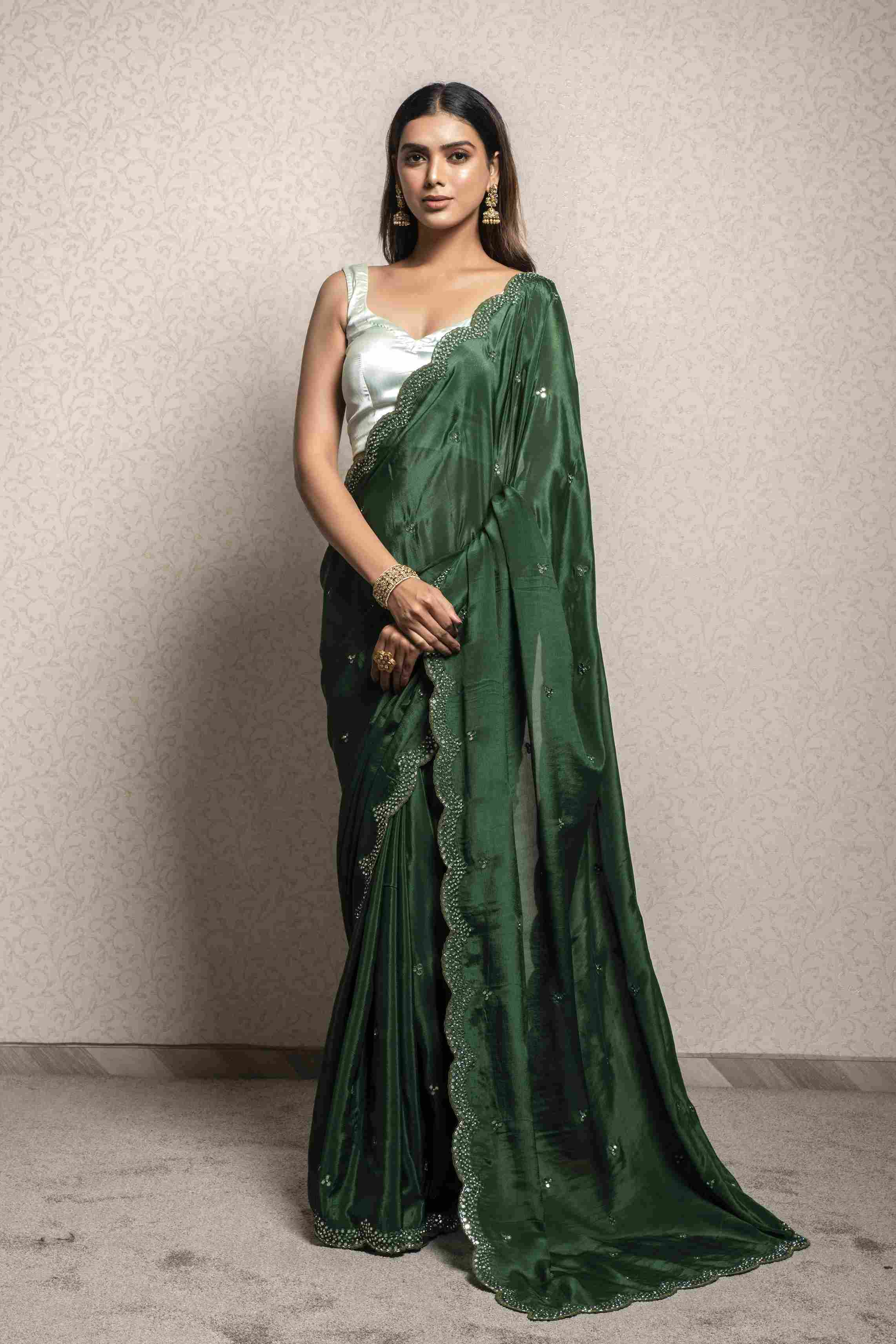 Dark Green color Saree in Chinnon Fabric