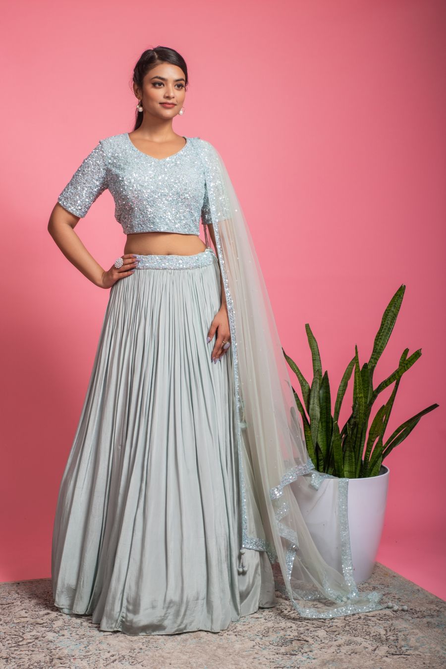 Heavy sequins Blouse with beautiful Skirt and Net Dupatta in Sea Blue color